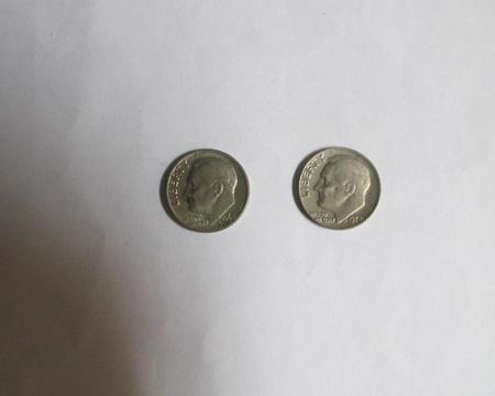 Monedas de un dime de plata de 1965 y 1978