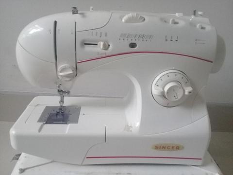 Maquina de coser nueva marca singer contactar al 960398021