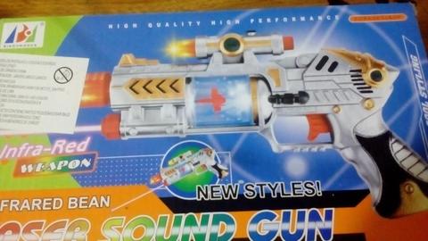 Remato juguete pistola musical con laser luces y sonido olivos