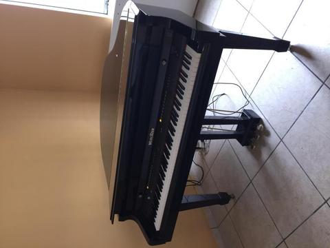 Piano de cola Wurlitzer automatico
